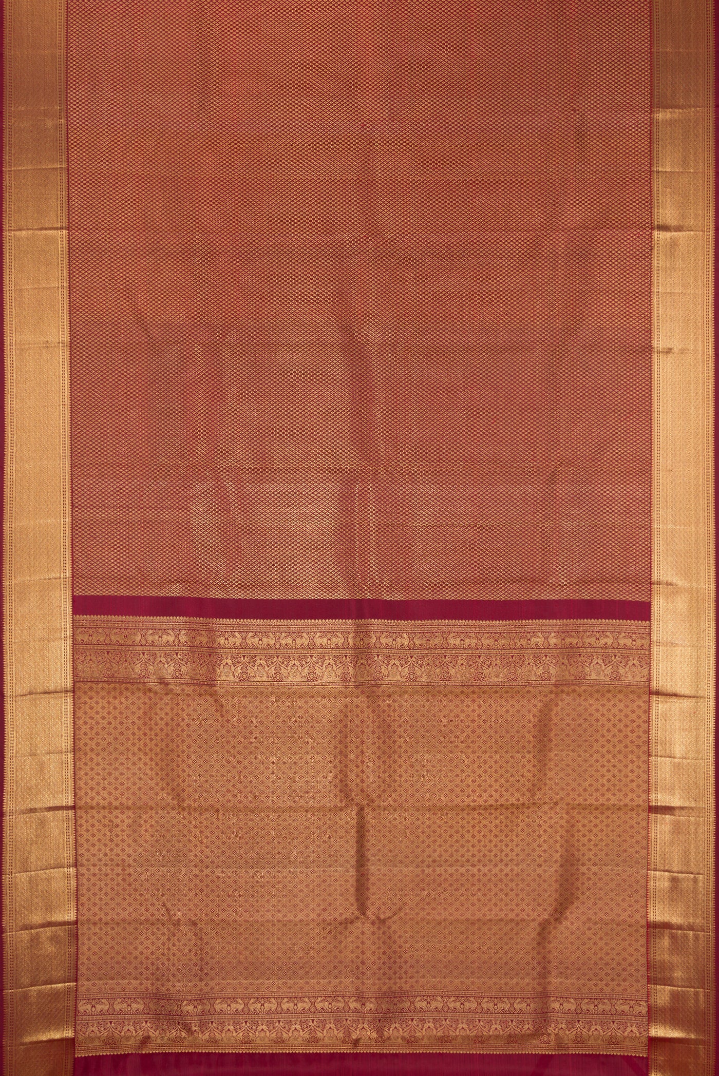 Maroon Dual Tone Kanchipuram Silk Saree with Zari Brocade on the body and Zari Border.  displayed on a mannequin