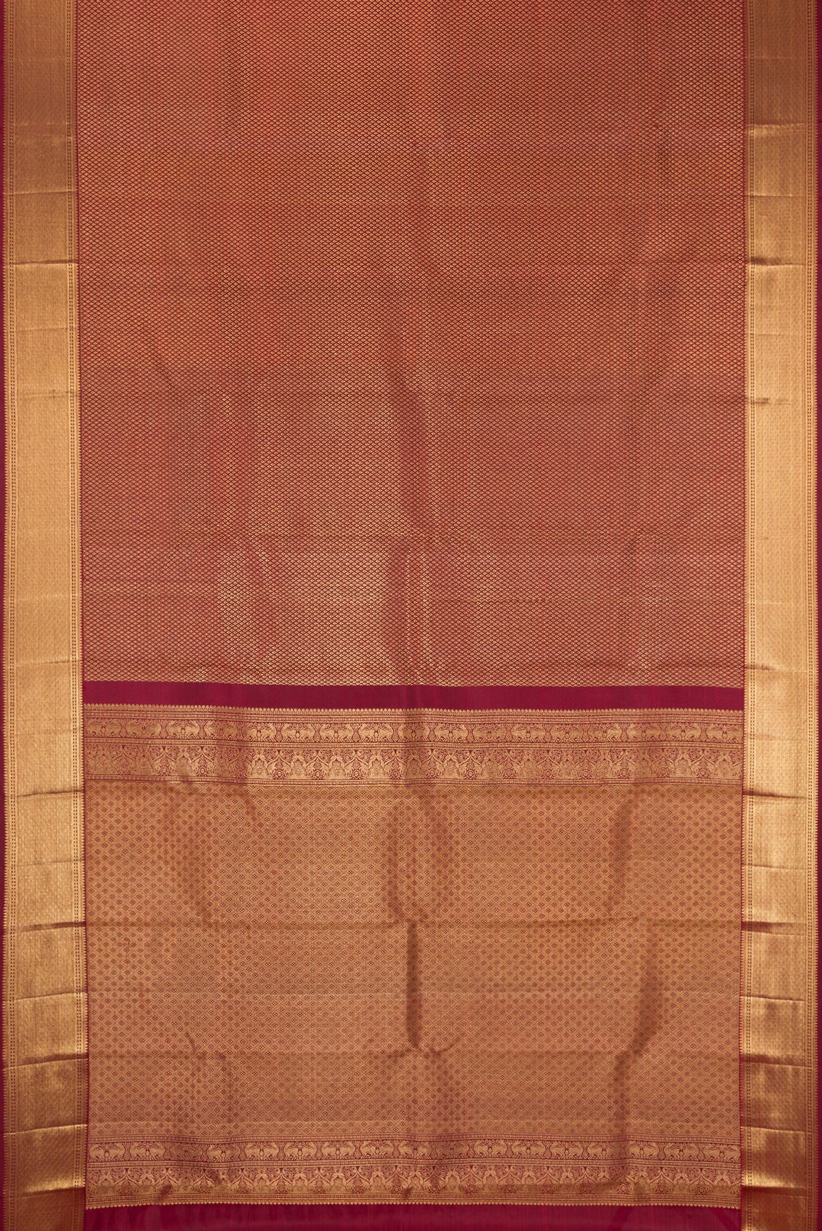 Maroon Dual Tone Kanchipuram Silk Saree with Zari Brocade on the body and Zari Border.  displayed on a mannequin