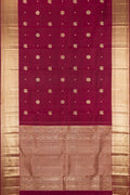 Maroon Dual Tone Kanchipuram Silk Saree with Zari Butta on the body and Zari Border.  displayed on a mannequin