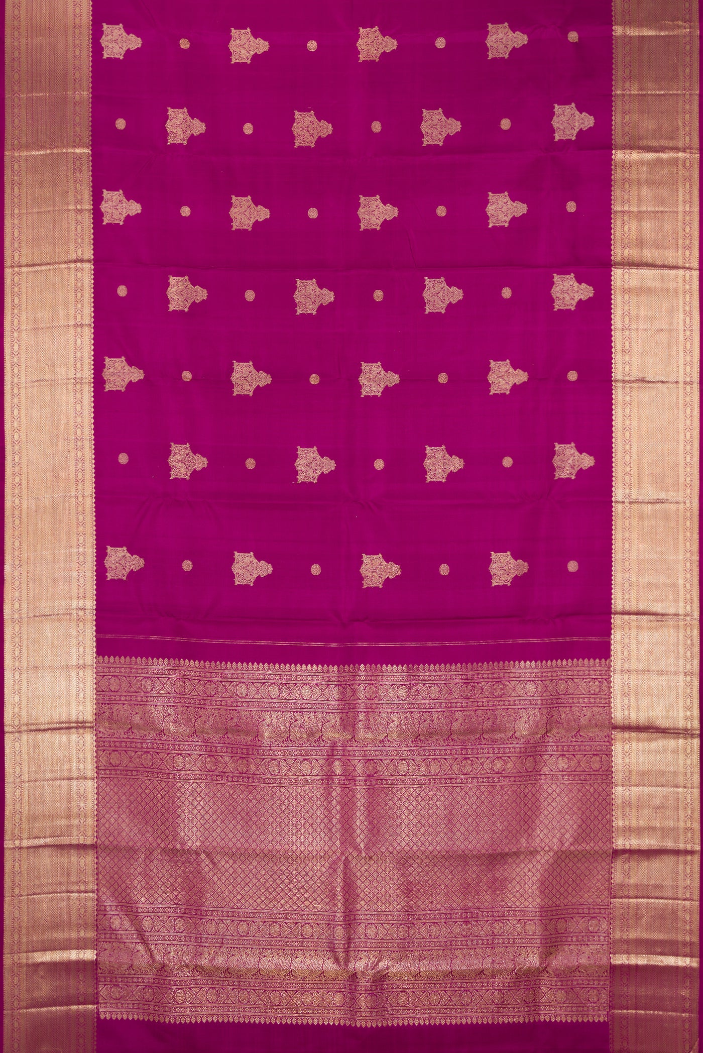 Purple Dual Tone Kanchipuram Silk Saree with Zari Butta on the body and Zari Border.  displayed on a mannequin