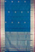 Peacock Blue Dual Tone Kanchipuram Silk Saree with Zari Butta on the body and Fancy Border.  displayed on a mannequin