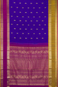 Royal Blue Dual Tone Kanchipuram Silk Saree with Zari Butta on the body and Ganga Jamuna Border.  displayed on a mannequin