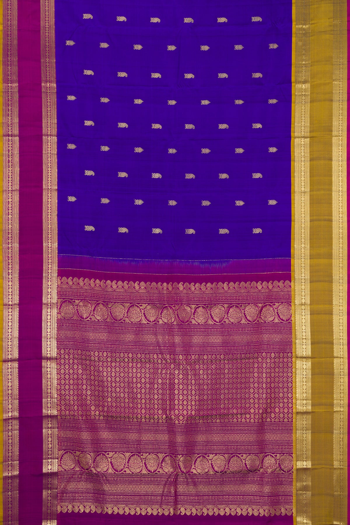 Royal Blue Dual Tone Kanchipuram Silk Saree with Zari Butta on the body and Ganga Jamuna Border.  displayed on a mannequin