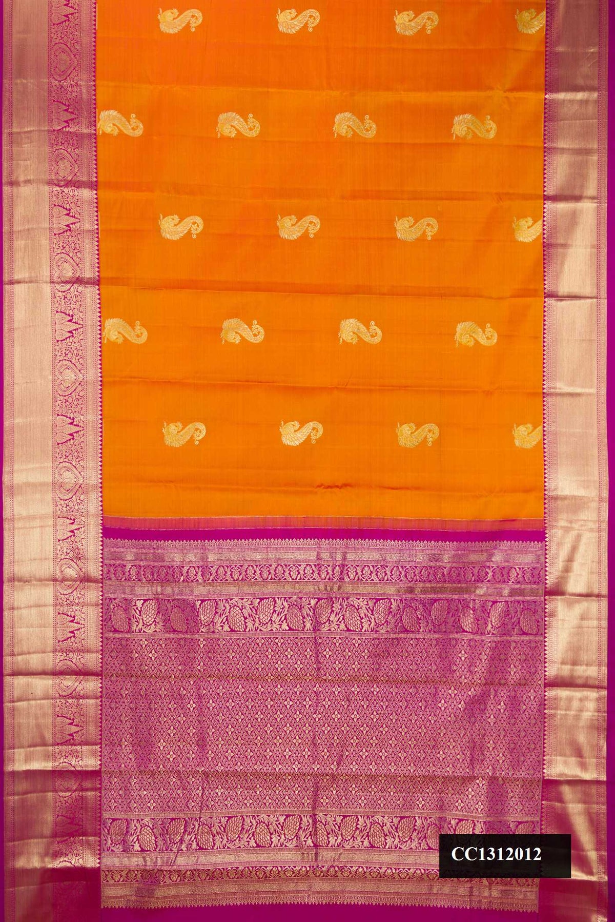 Mustard Dual Tone Kanchipuram Silk Saree with Zari Butta on the body and Zari Border.  displayed on a mannequin