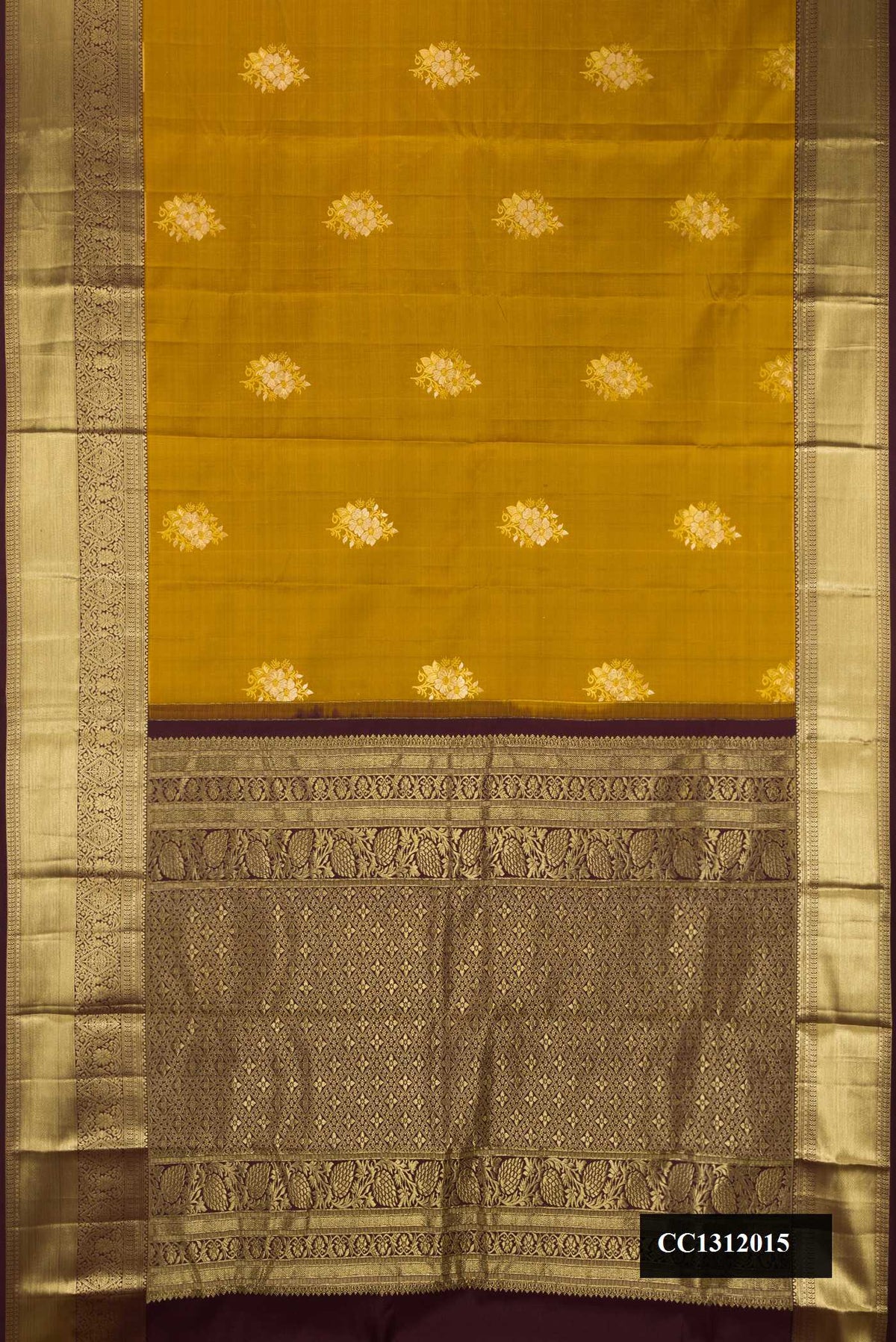 Mehandi Green Dual Tone Kanchipuram Silk Saree with Zari Butta on the body and Zari Border.  displayed on a mannequin