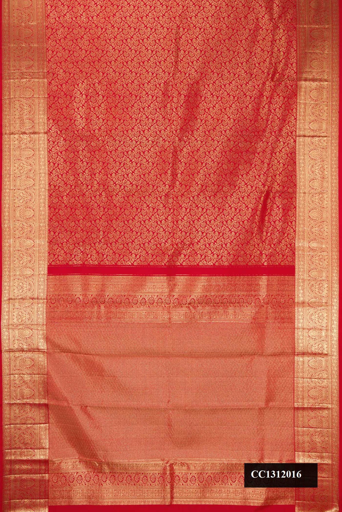 Red Dual Tone Kanchipuram Silk Saree with Zari Brocade on the body and Zari Border.  displayed on a mannequin