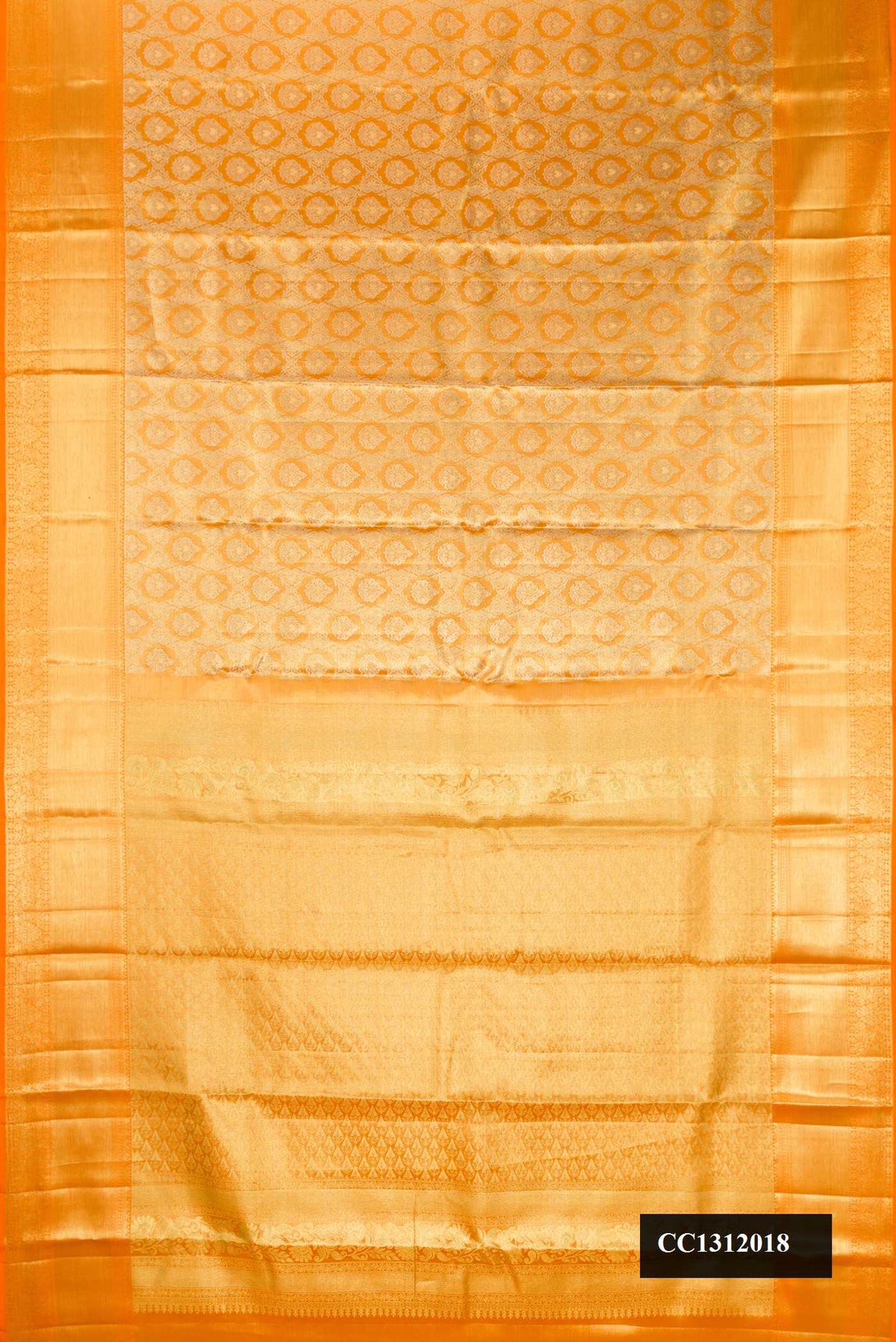 Mustard Dual Tone Kanchipuram Tissue Silk Saree with Zari Brocade on the body and Zari Border.  displayed on a mannequin