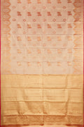 Gold Dual Tone Kanchipuram Tissue Silk Saree with Zari Brocade on the body and Fancy Border.  displayed on a mannequin