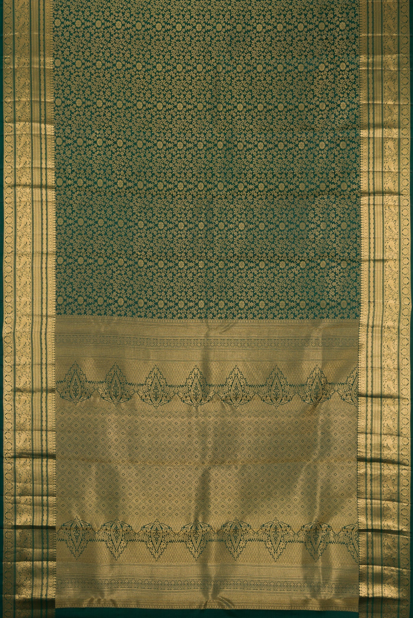 Bottle Green Dual Tone Kanchipuram Silk Saree with Zari Brocade on the body and Fancy Border.  displayed on a mannequin
