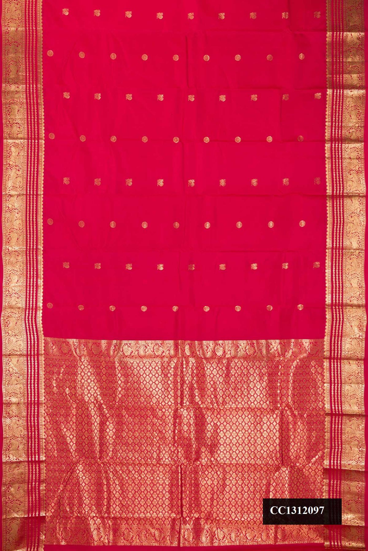 Dark Pink Dual Tone Kanchipuram Silk Saree with Zari Butta on the body and Zari Border.  displayed on a mannequin