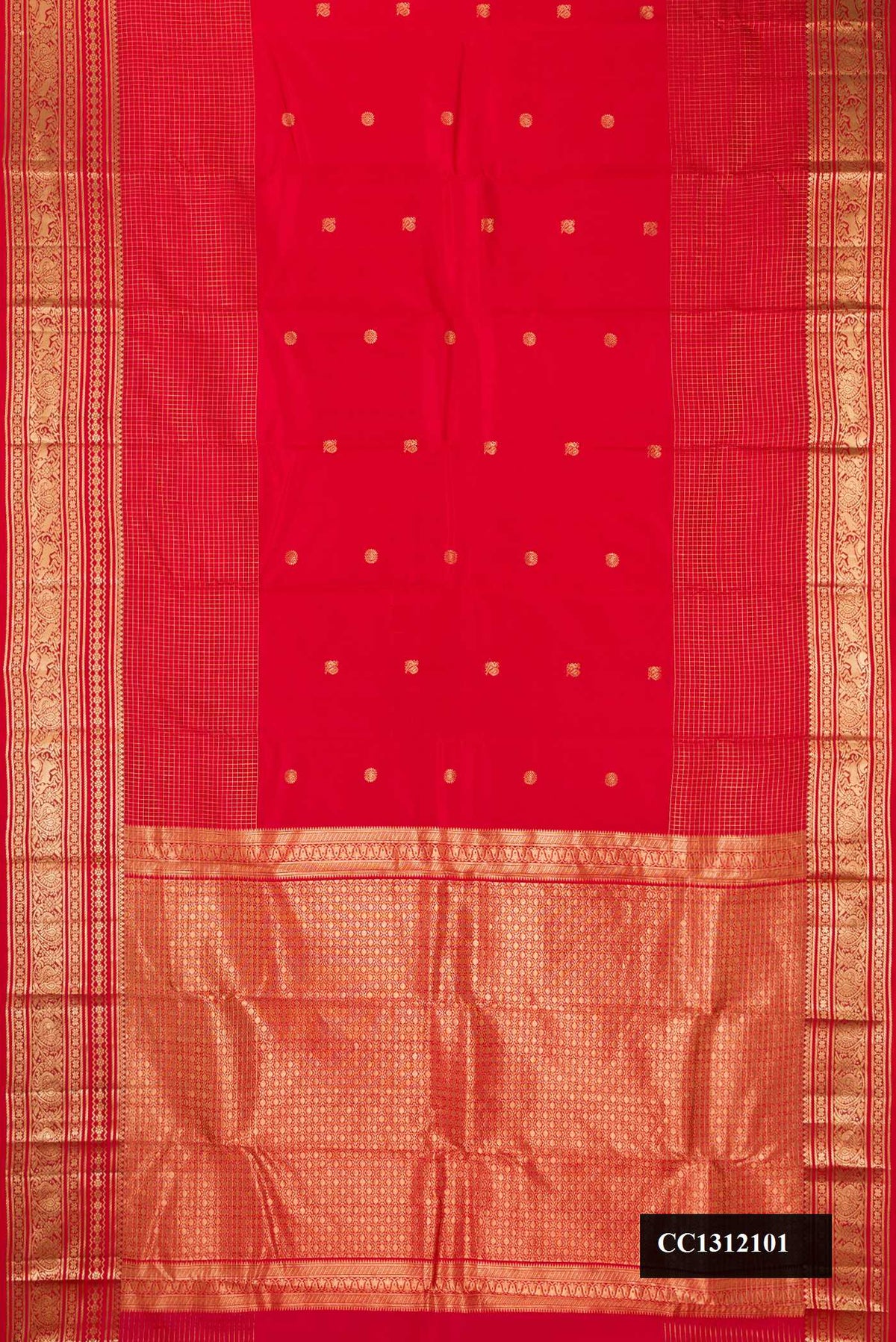 Red Dual Tone Kanchipuram Silk Saree with Zari Butta on the body and Zari Border.  displayed on a mannequin