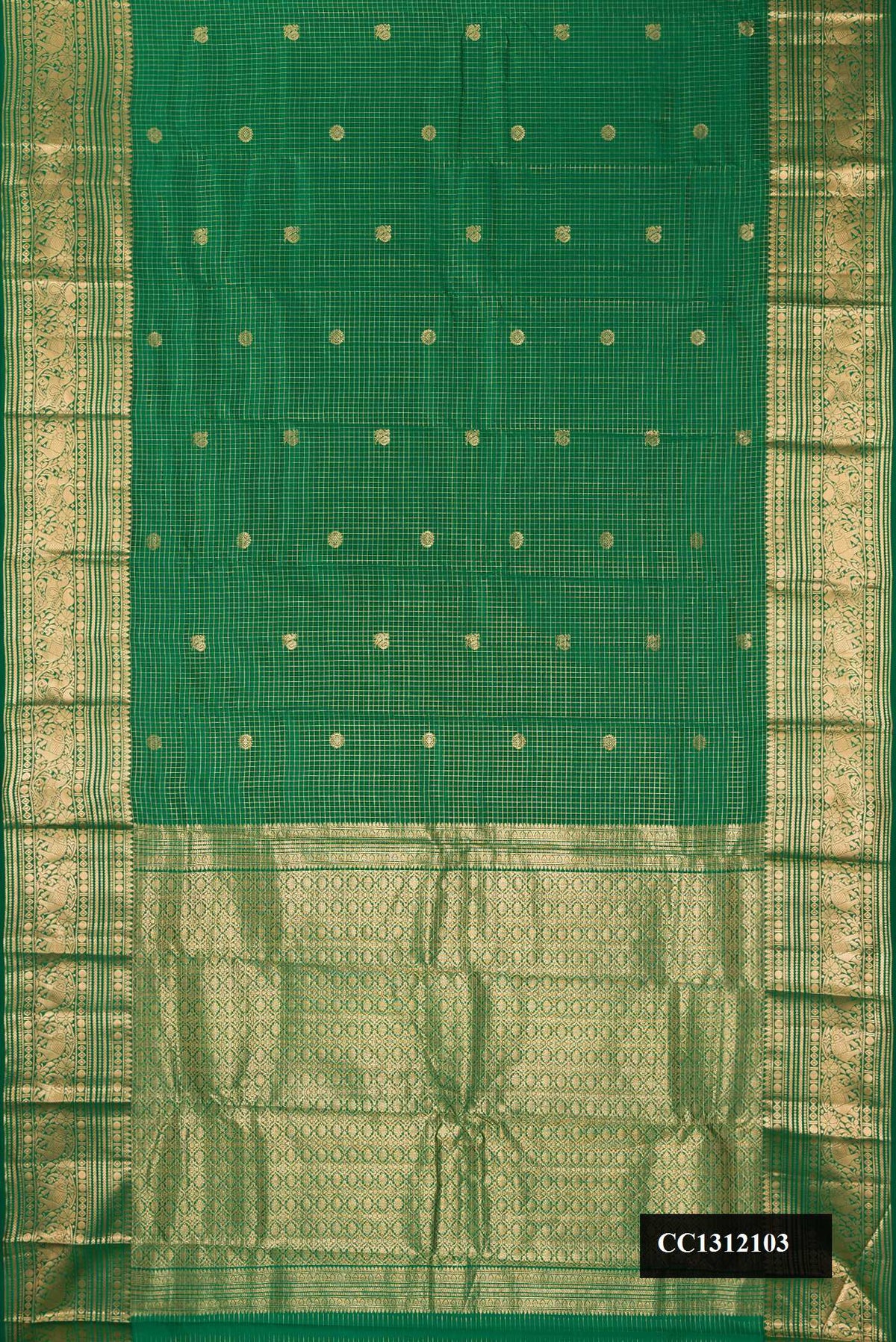 Green Dual Tone Kanchipuram Silk Saree with Checked design on the body and Zari Border.  displayed on a mannequin