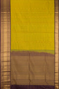 Mehandi Green Dual Tone Kanchipuram Silk Saree with Checked design on the body and Fancy Border.  displayed on a mannequin
