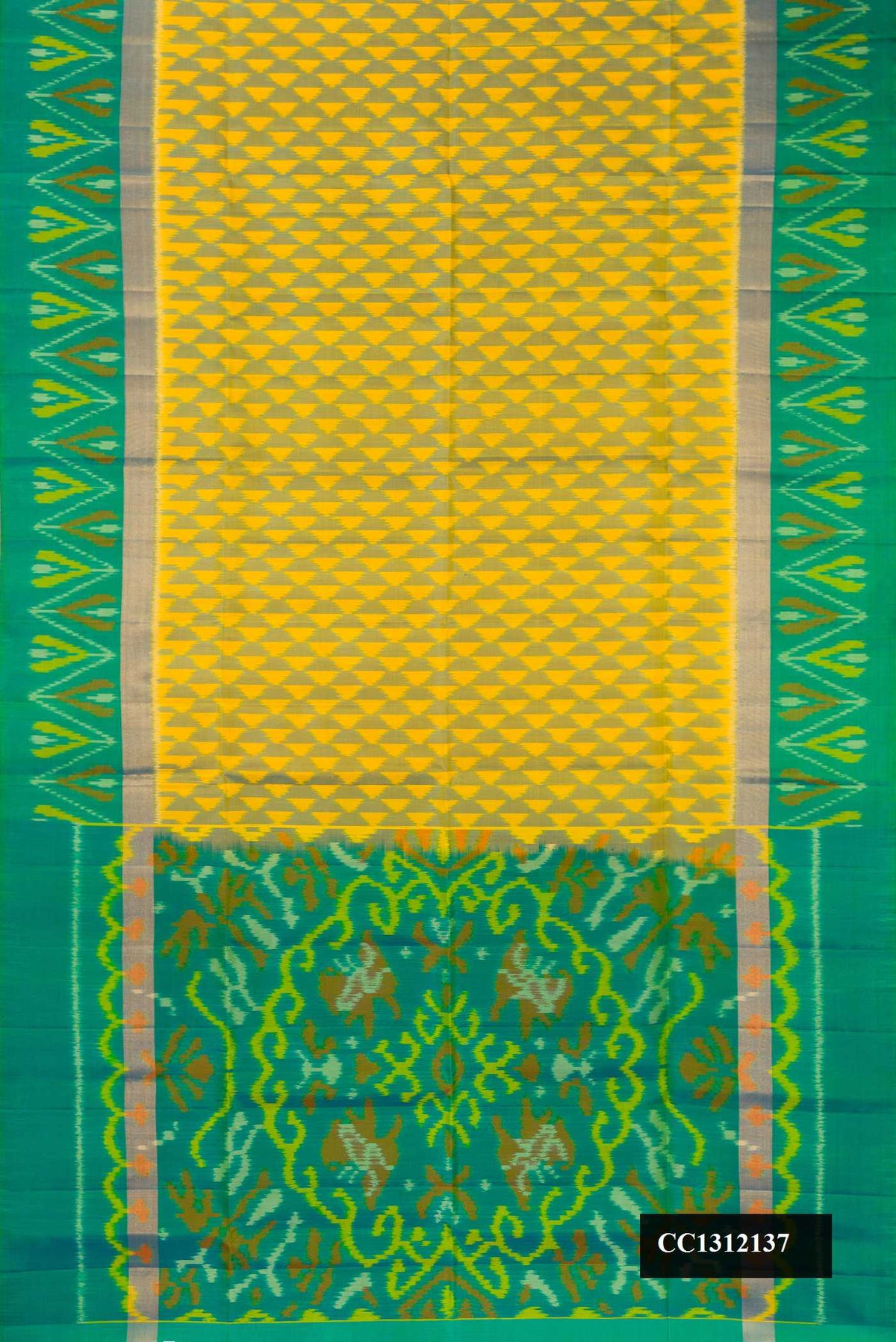 Mustard Dual Tone Soft Silk Saree with Ikat Print on the body and Ikat Border.  displayed on a mannequin