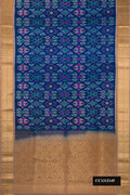 Navy Blue Dual Tone Soft Silk Saree with Ikat Print on the body and Zari Border.  displayed on a mannequin