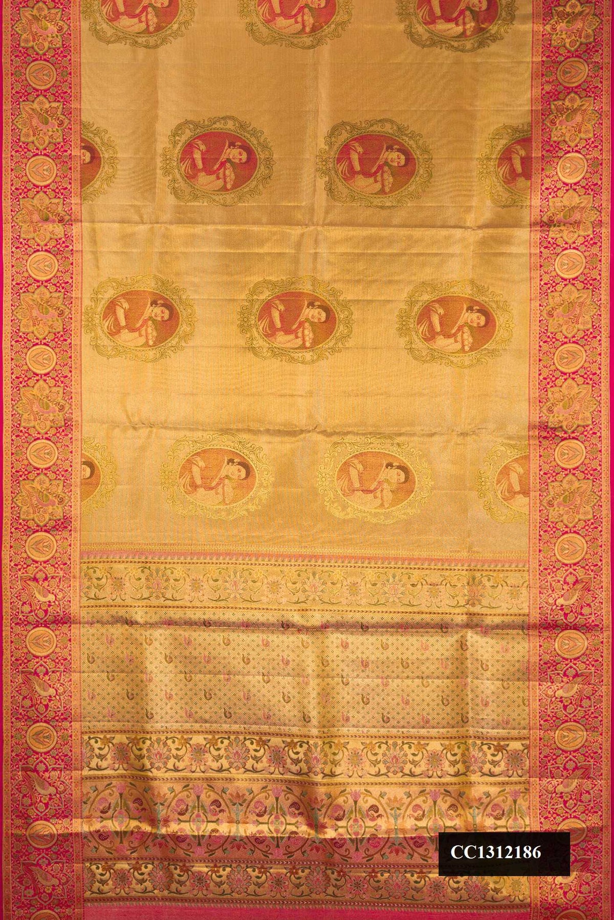 Gold Dual Tone Kanchipuram Tissue Silk Saree with Zari Brocade on the body and Fancy Border.  displayed on a mannequin