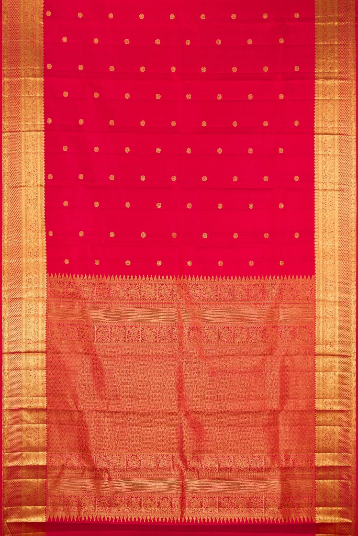 Red Dual Tone Kanchipuram Silk Saree with Zari Butta on the body and Zari Border.  displayed on a mannequin