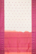 Off White Dual Tone Kanchipuram Silk Saree with Thread Butta on the body and Thread Border.  displayed on a mannequin