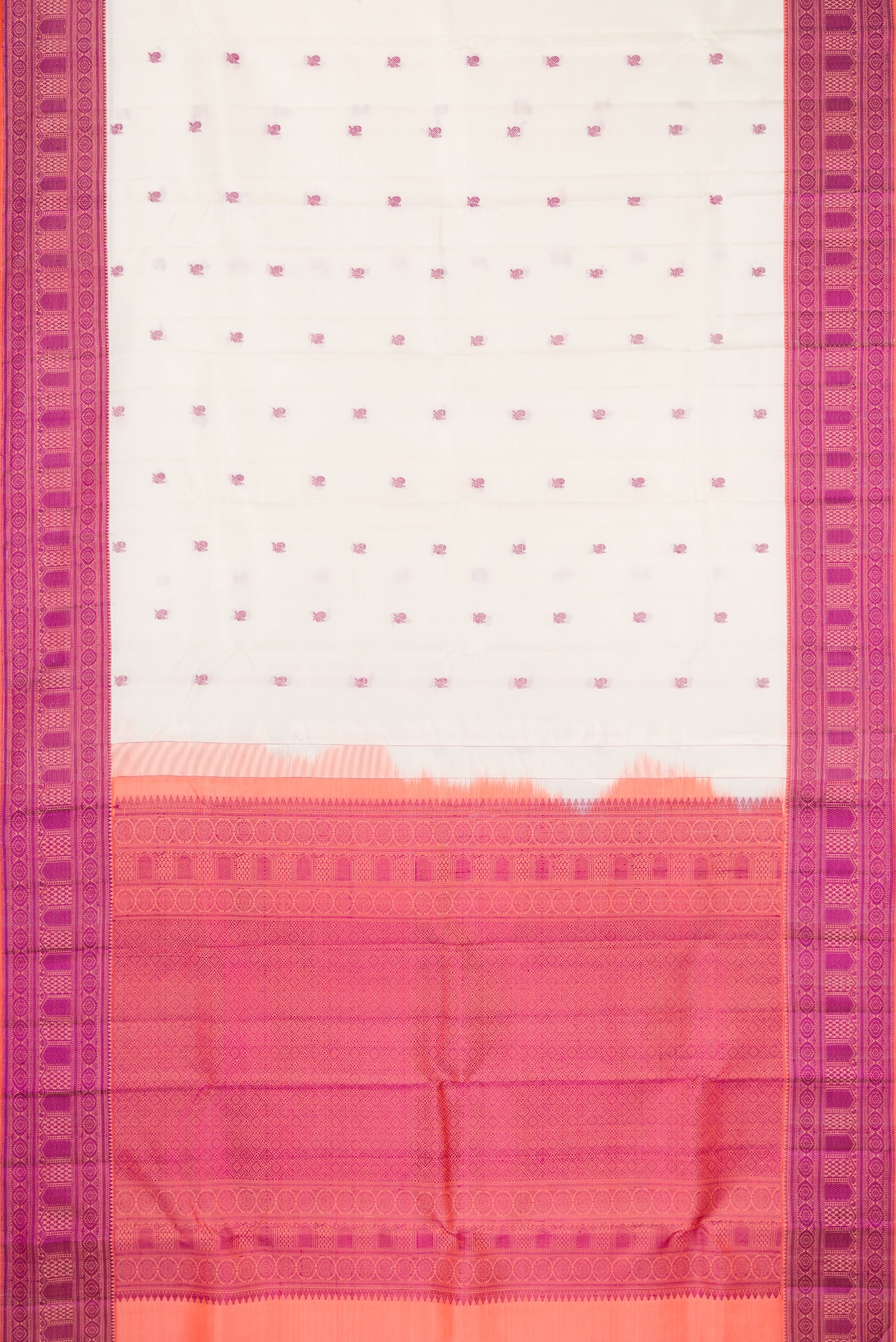Off White Dual Tone Kanchipuram Silk Saree with Thread Butta on the body and Thread Border.  displayed on a mannequin