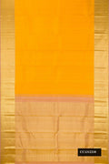 Mustard Dual Tone Kanchipuram Silk Saree with Checked design on the body and Zari Border.  displayed on a mannequin