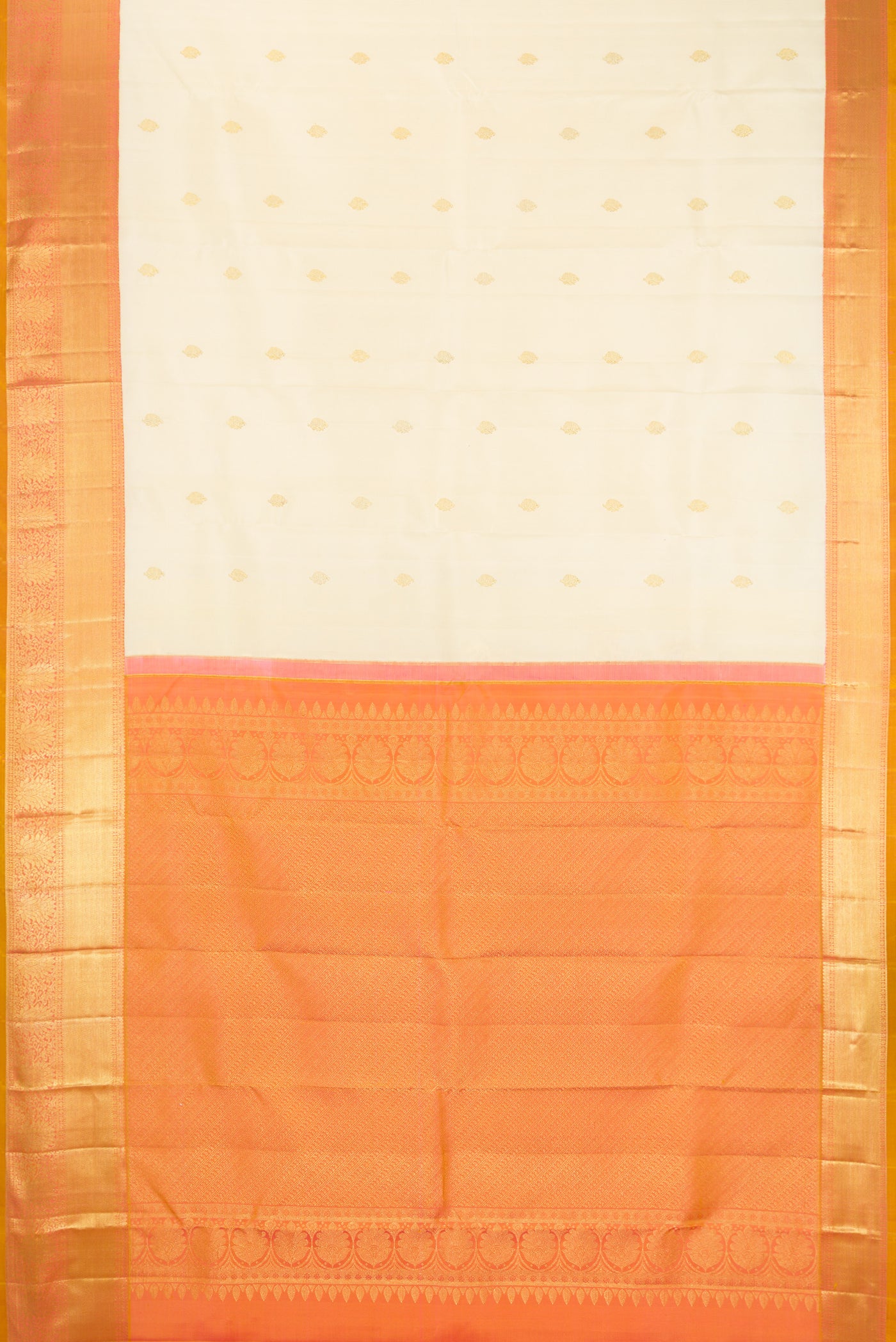 Sandal Dual Tone Kanchipuram Silk Saree with Zari Butta on the body and Zari Border.  displayed on a mannequin