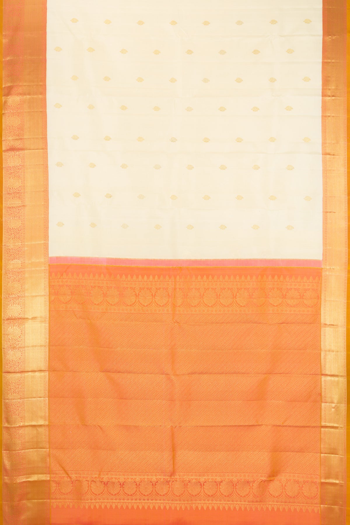 Sandal Dual Tone Kanchipuram Silk Saree with Zari Butta on the body and Zari Border.  displayed on a mannequin