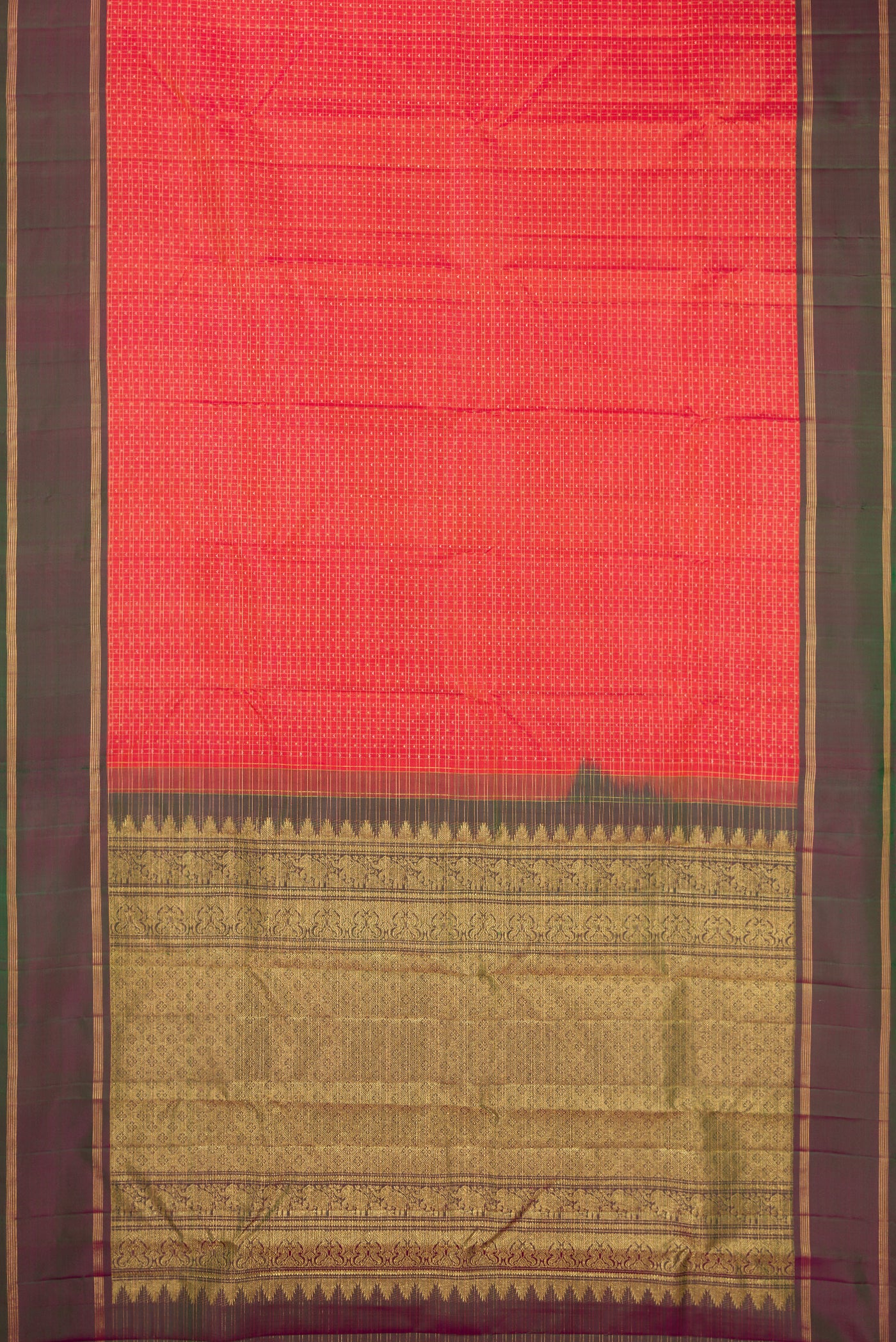 Red Dual Tone Kanchipuram Silk Saree with Zari Brocade on the body and Zari Border.  displayed on a mannequin