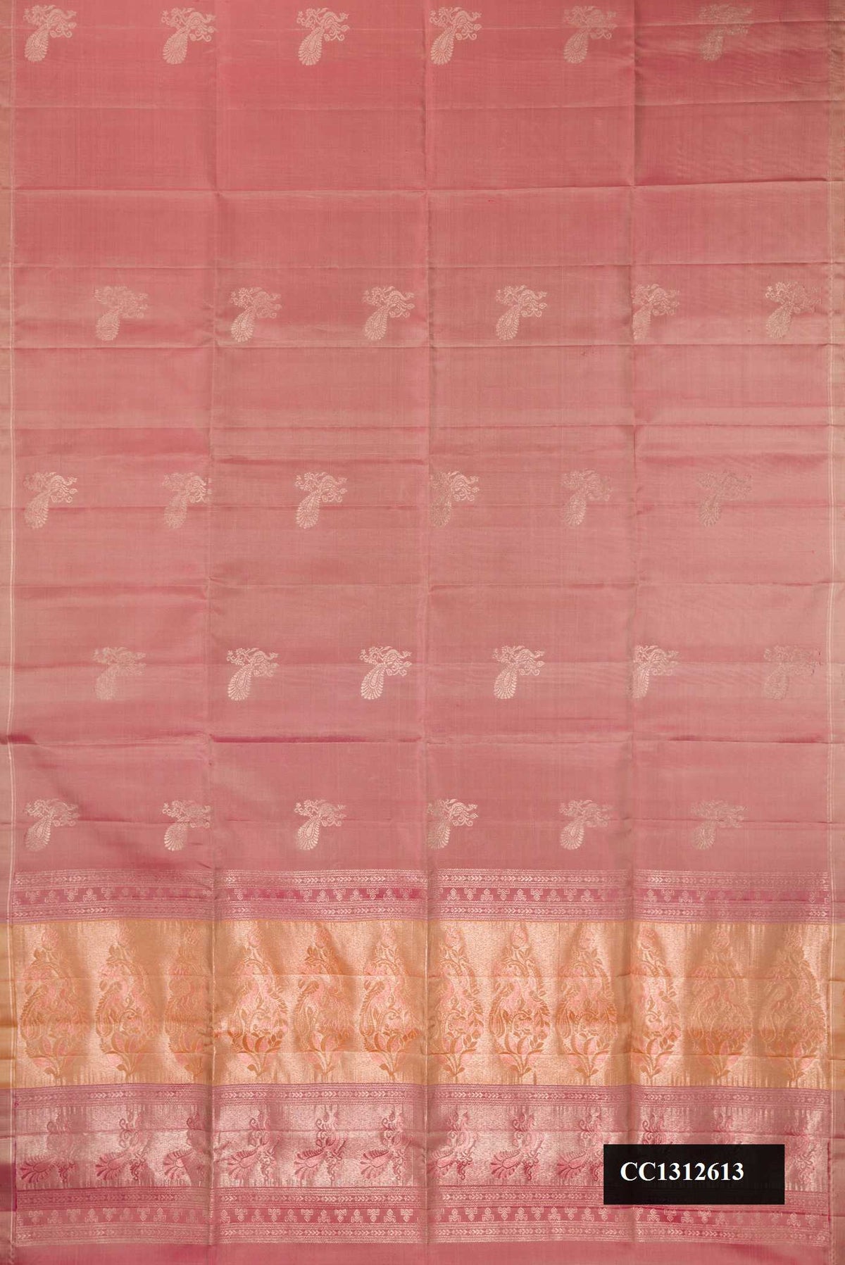 Rose Gold Dual Tone Soft Silk Saree with Zari Butta on the body and Zari Border.  displayed on a mannequin