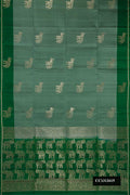 Light Green Dual Tone Soft Silk Saree with Zari Butta on the body and Fancy Border.  displayed on a mannequin