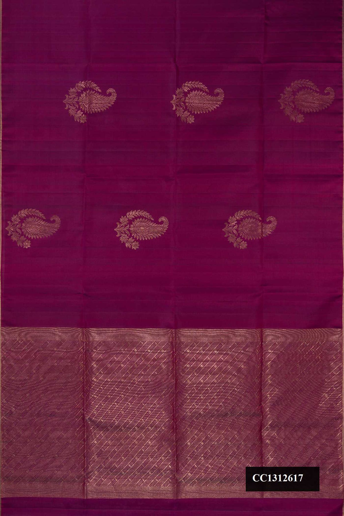 Burgundy Dual Tone Soft Silk Saree with Zari Butta on the body and Without Border.  displayed on a mannequin