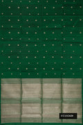 Bottle Green Dual Tone Soft Silk Saree with Zari Butta on the body and Without Border.  displayed on a mannequin