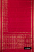 Rust Dual Tone Kanchipuram Silk Saree with Zari Butta on the body and Zari Border.  displayed on a mannequin
