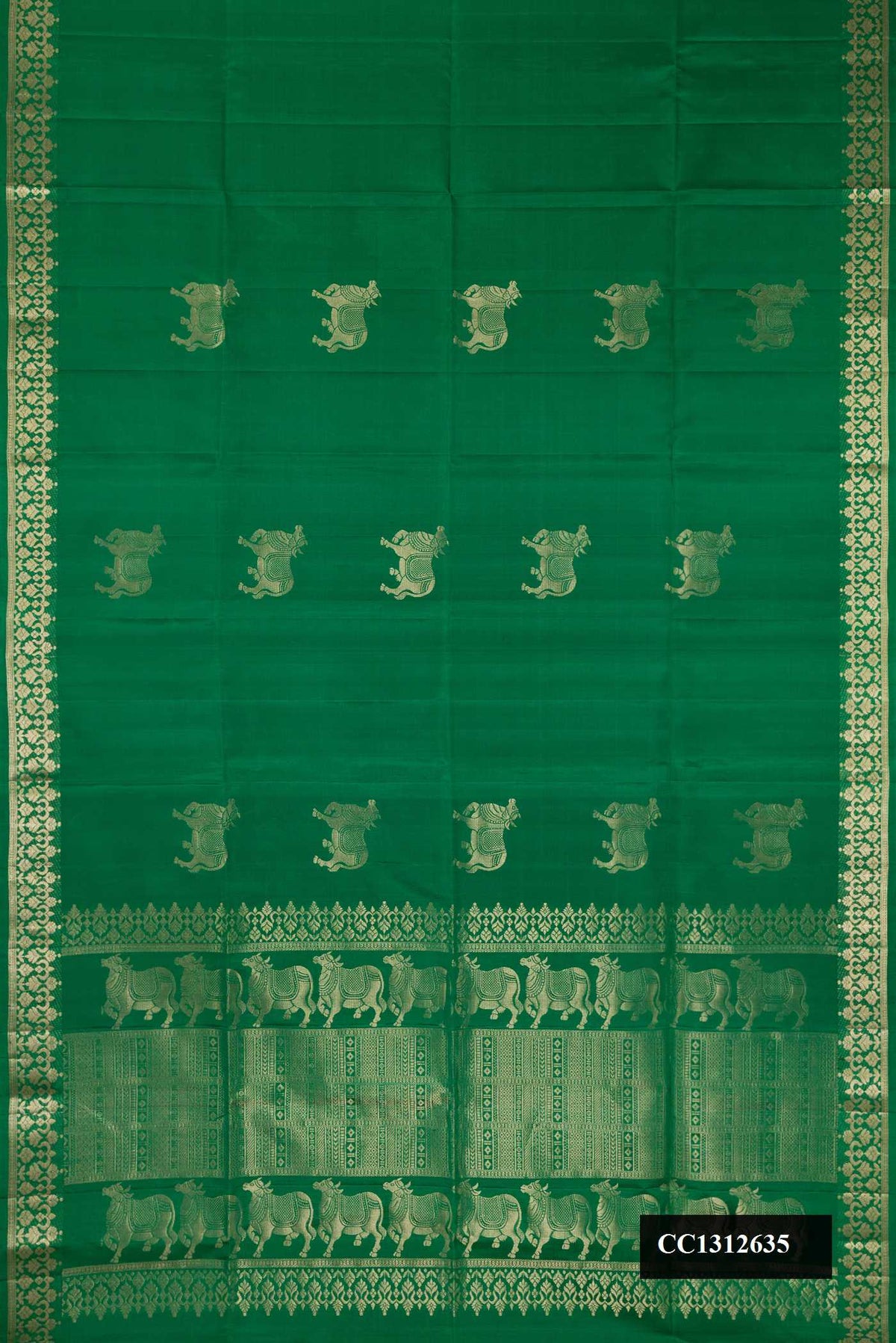 Green Dual Tone Soft Silk Saree with Zari Butta on the body and Fancy Border.  displayed on a mannequin