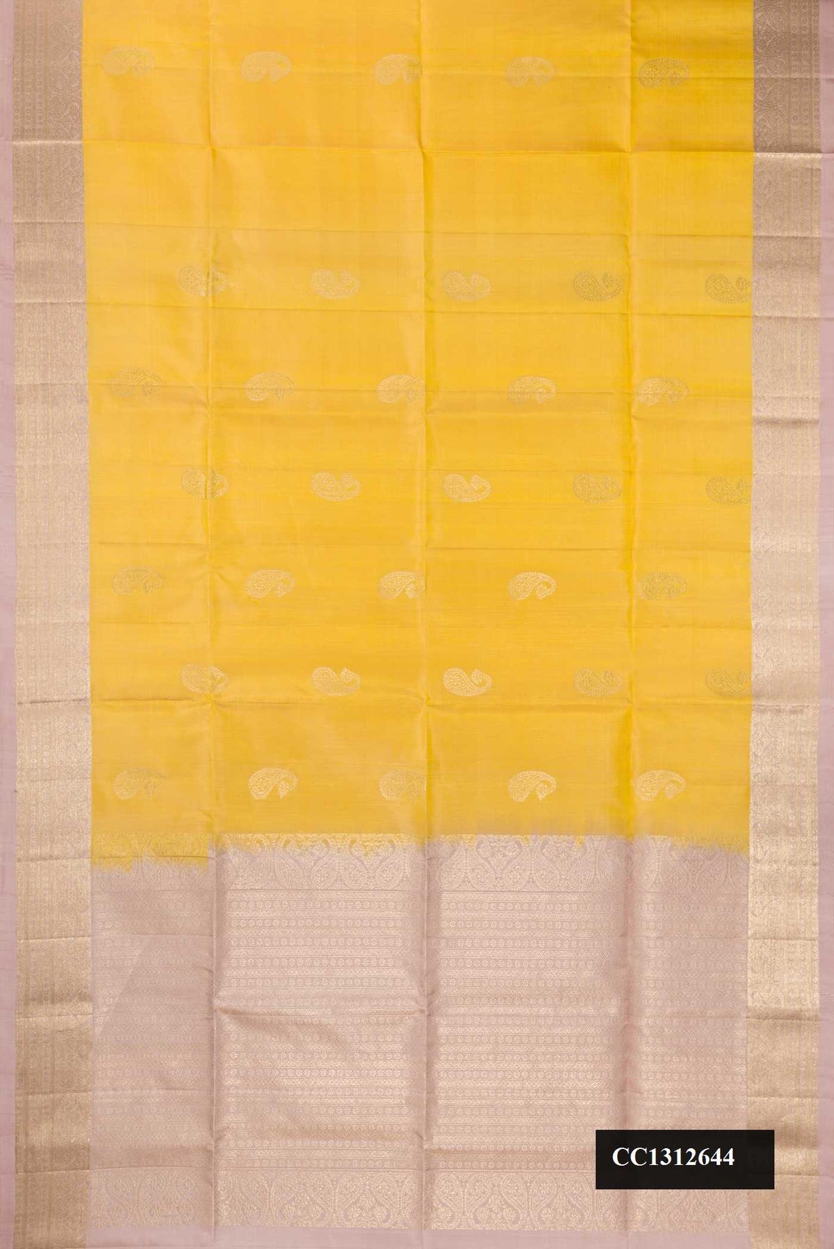 Lemon Yellow Dual Tone Soft Silk Saree with Zari Butta on the body and Zari Border.  displayed on a mannequin