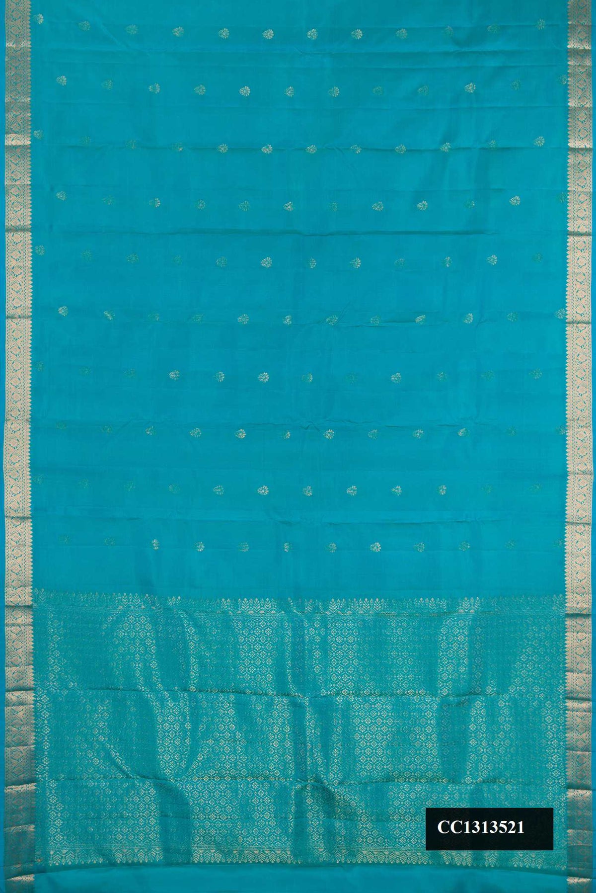 Sky Blue Dual Tone Kanchipuram Silk Saree with Zari Butta on the body and Zari Border.  displayed on a mannequin