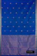 Royal Blue Dual Tone Kanchipuram Silk Saree with Zari Butta on the body and Zari Border.  displayed on a mannequin