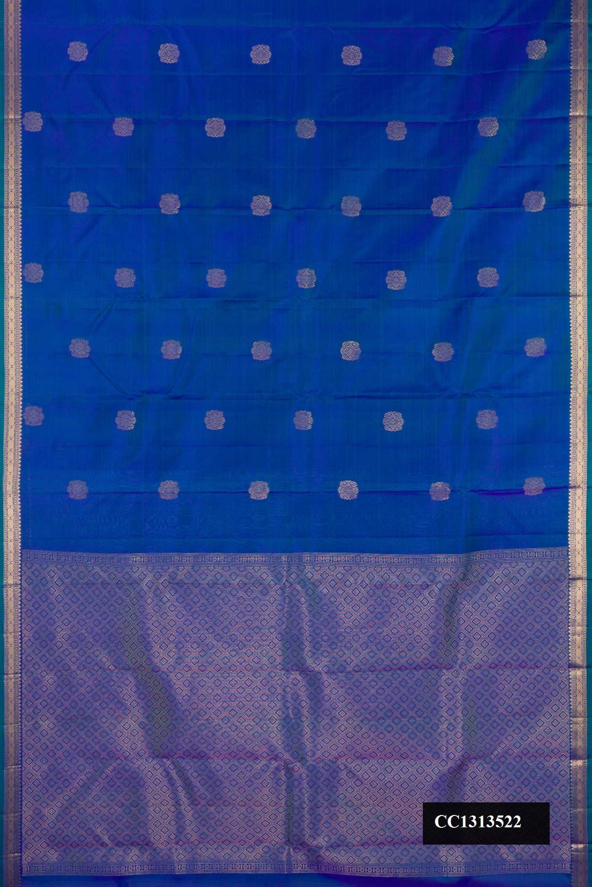 Royal Blue Dual Tone Kanchipuram Silk Saree with Zari Butta on the body and Zari Border.  displayed on a mannequin
