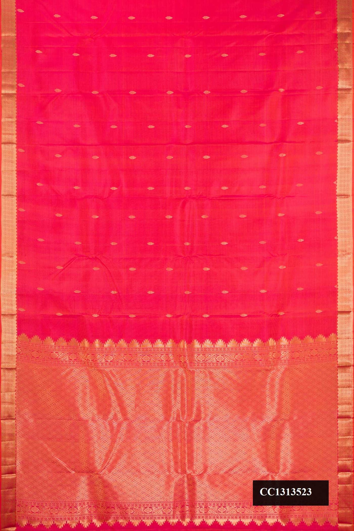 Coral Dual Tone Kanchipuram Silk Saree with Stripes on the body and Zari Border.  displayed on a mannequin
