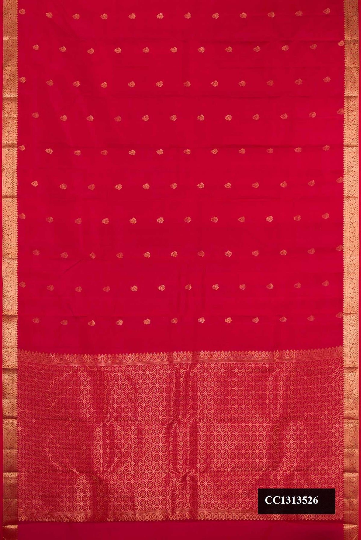Maroon Dual Tone Kanchipuram Silk Saree with Zari Butta on the body and Zari Border.  displayed on a mannequin