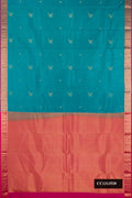 Blue Dual Tone Kanchipuram Silk Saree with Zari Butta on the body and Fancy Border.  displayed on a mannequin