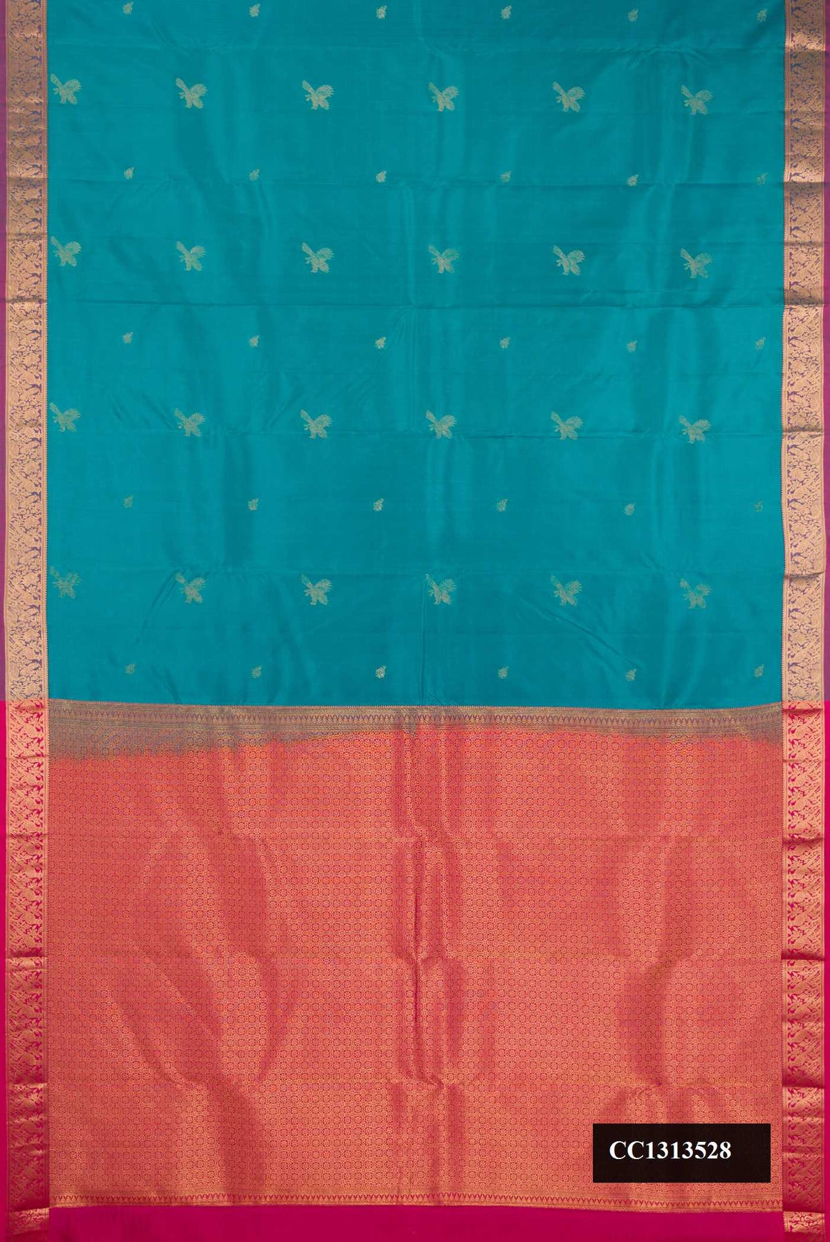 Blue Dual Tone Kanchipuram Silk Saree with Zari Butta on the body and Fancy Border.  displayed on a mannequin