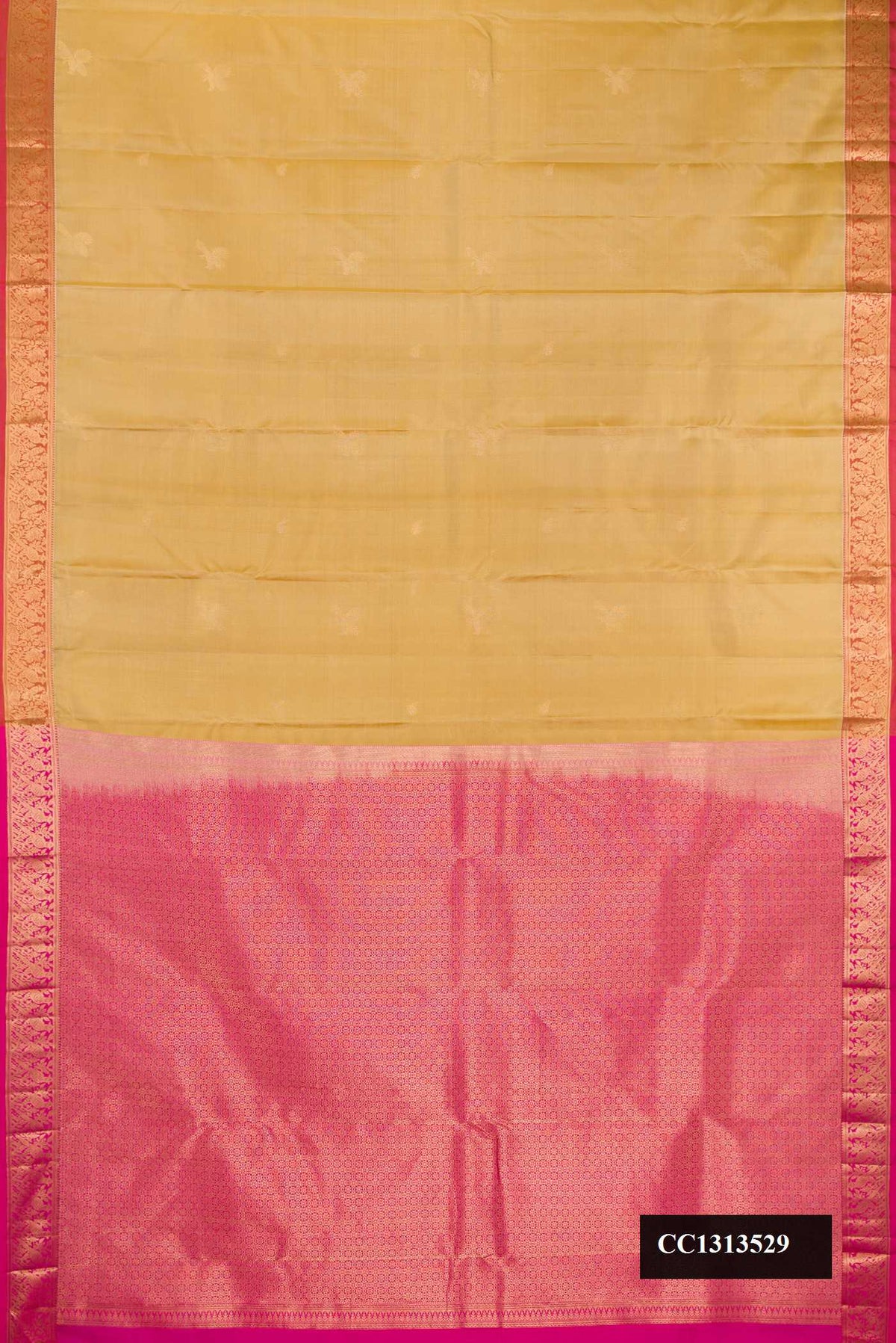 Dark Beige Dual Tone Kanchipuram Silk Saree with Zari Butta on the body and Zari Border.  displayed on a mannequin