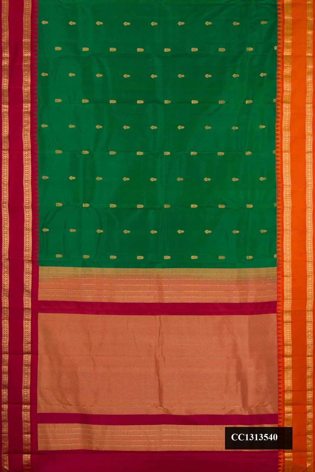 Bottle Green Dual Tone Kanchipuram Silk Saree with Zari Butta on the body and Ganga Jamuna Border.  displayed on a mannequin