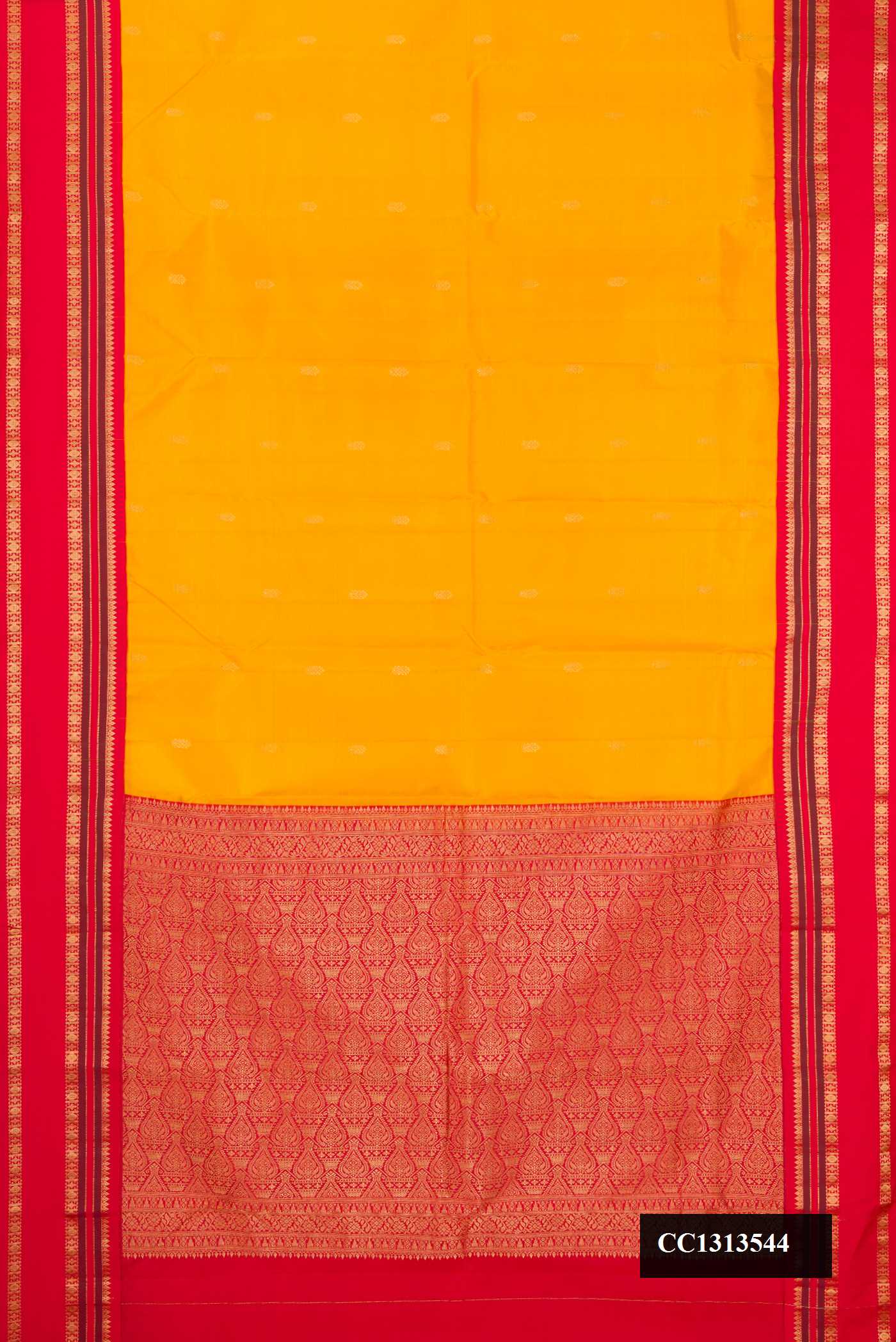 Mustard Dual Tone Kanchipuram Silk Saree with Zari Butta on the body and Fancy Border.  displayed on a mannequin
