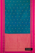 Peacock Blue Dual Tone Kanchipuram Silk Saree with Zari Butta on the body and Fancy Border.  displayed on a mannequin