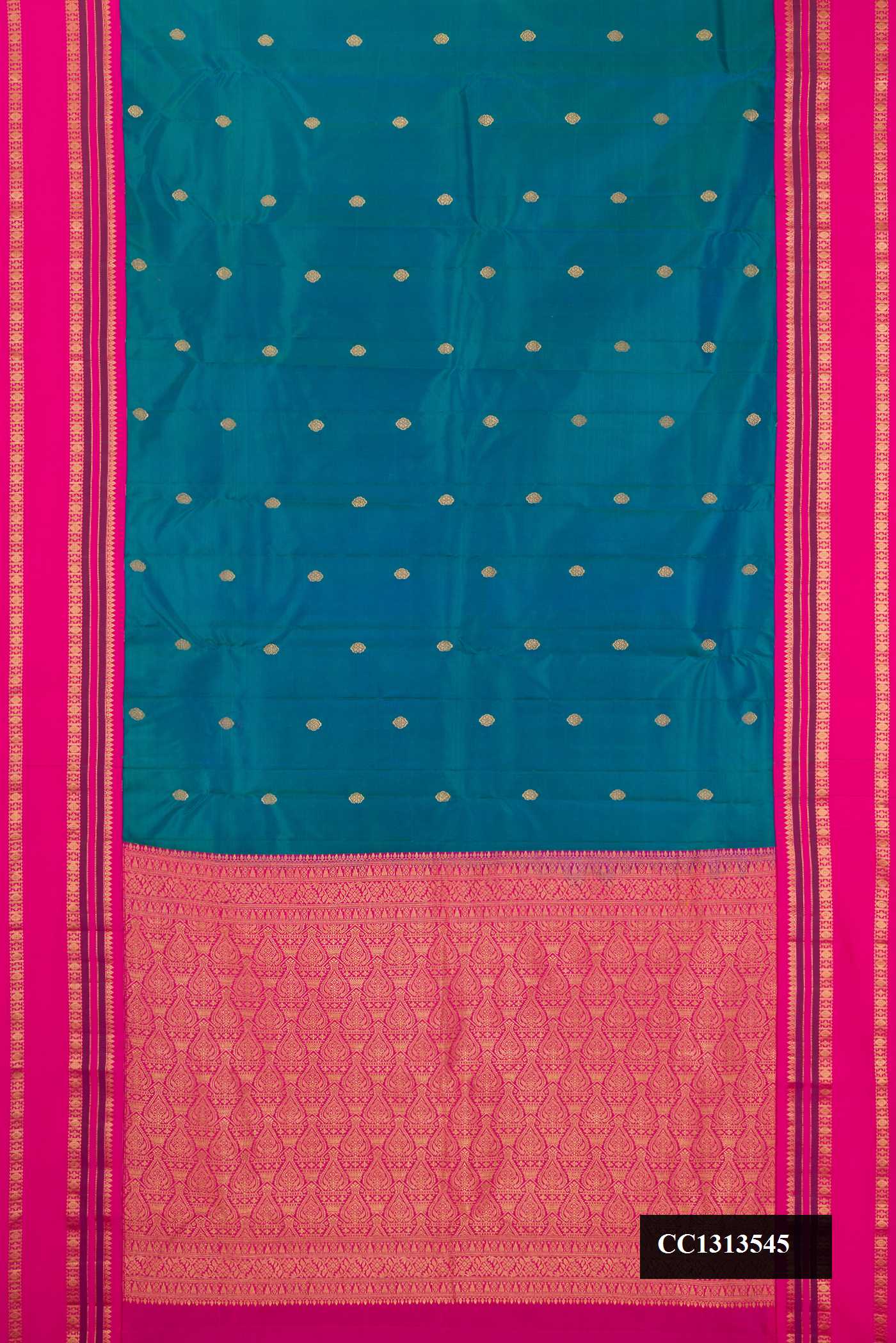 Peacock Blue Dual Tone Kanchipuram Silk Saree with Zari Butta on the body and Fancy Border.  displayed on a mannequin