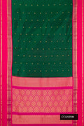 Bottle Green Dual Tone Kanchipuram Silk Saree with Zari Butta on the body and Fancy Border.  displayed on a mannequin