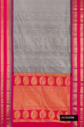 Grey Dual Tone Kanchipuram Silk Saree with Zari Butta on the body and Fancy Border.  displayed on a mannequin
