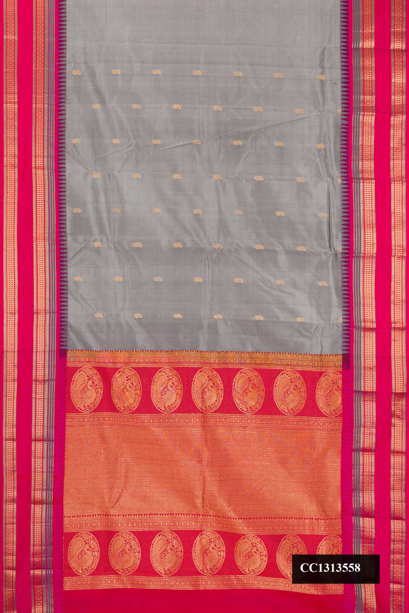 Grey Dual Tone Kanchipuram Silk Saree with Zari Butta on the body and Fancy Border.  displayed on a mannequin