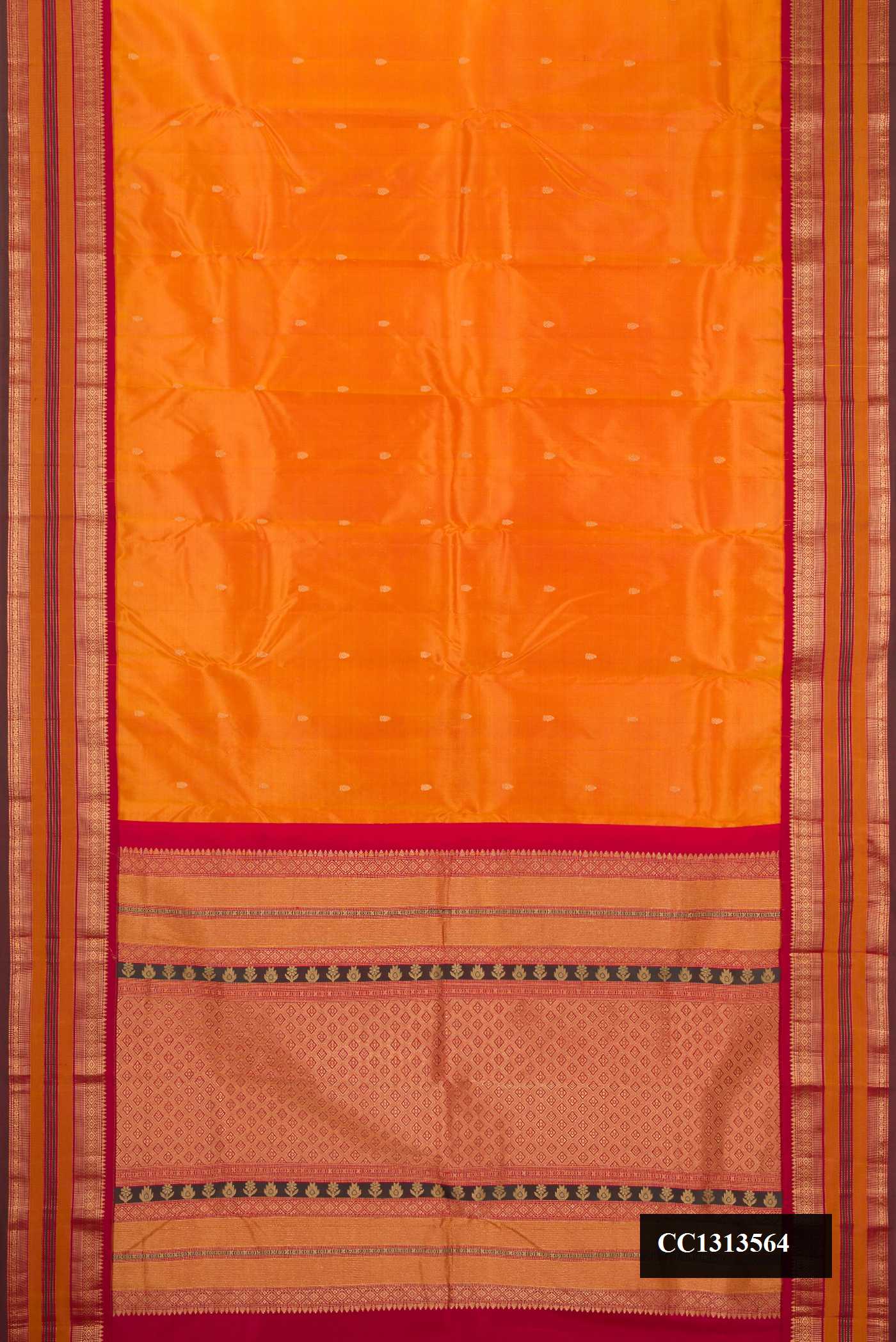 Mustard Dual Tone Kanchipuram Silk Saree with Zari Butta on the body and Fancy Border.  displayed on a mannequin